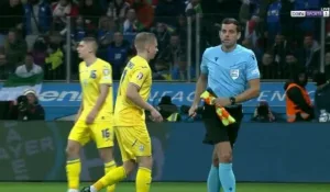 A comical shot from the flag referee in the Italy-Ukraine match in the Euro qualifiers